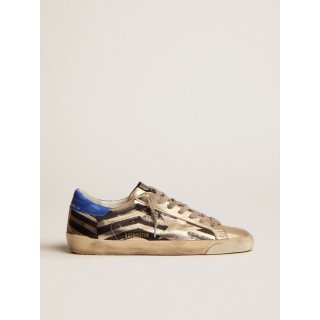 Super-Star sneakers in platinum-colored laminated leather with black flag print and red and blue heel tab